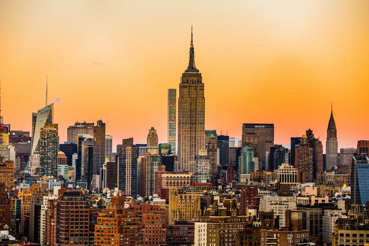 Manhattan skyline at sunset with the Empire State Building